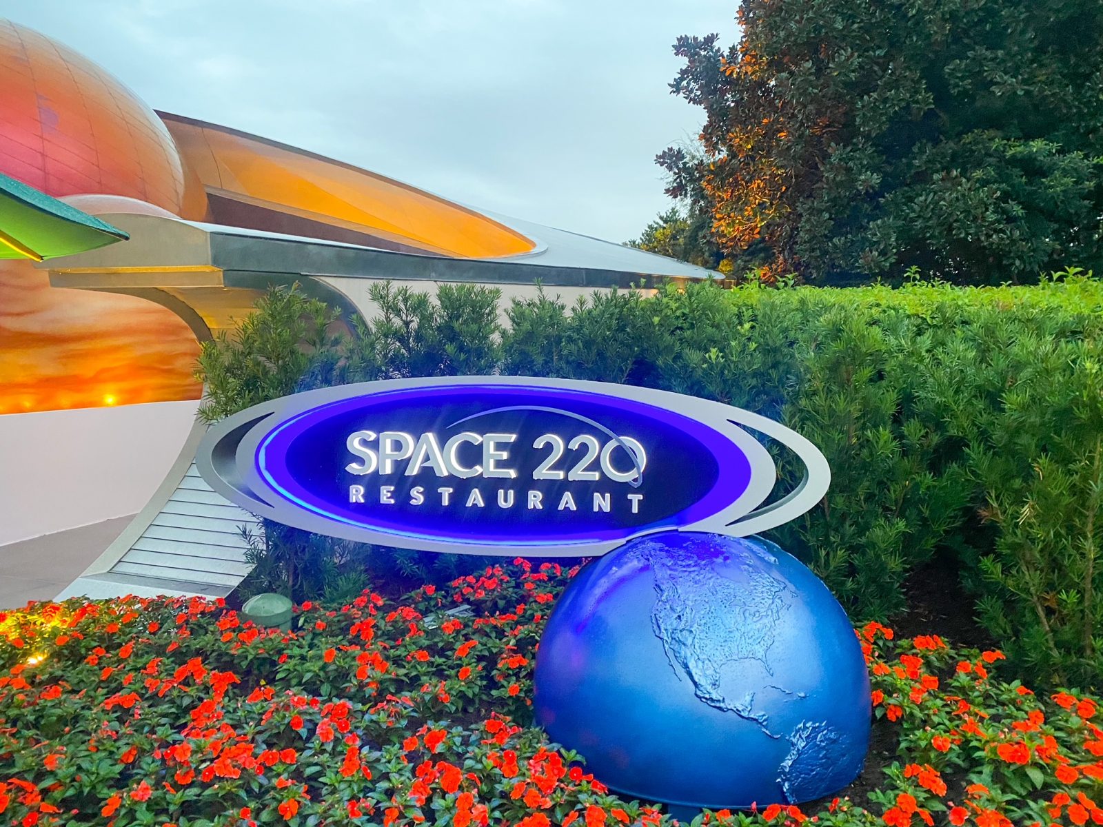 fake planets and space 220 sign epcot restaurants
