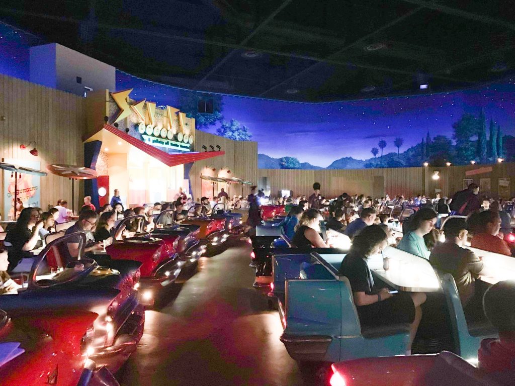 rows of people in cars at the sci-fi dine-in theater, one of the best Hollywood Studios restaurants 