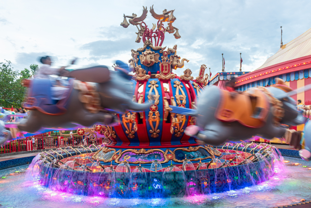 Dumbo the Flying Elephant ride, in motion; one of the Disney Magic Kingdom Rides we'd recommend for families