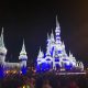 Cinderella Castle decorated in Christmas lights at Disney