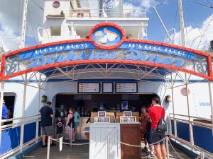 blue and red boat entrance Disney restaurants