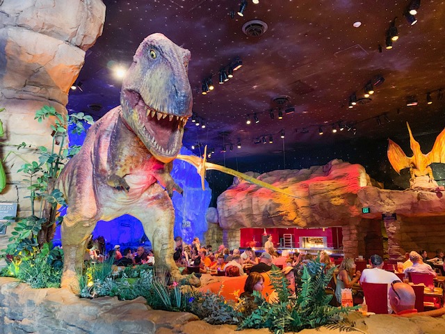 Disney Springs Restaurant T Rex interior showing large dinosaurs