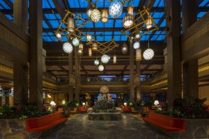 lobby of Disney's Grand Polynesian hotel with various lanterns hanging from the sky Disney character dining