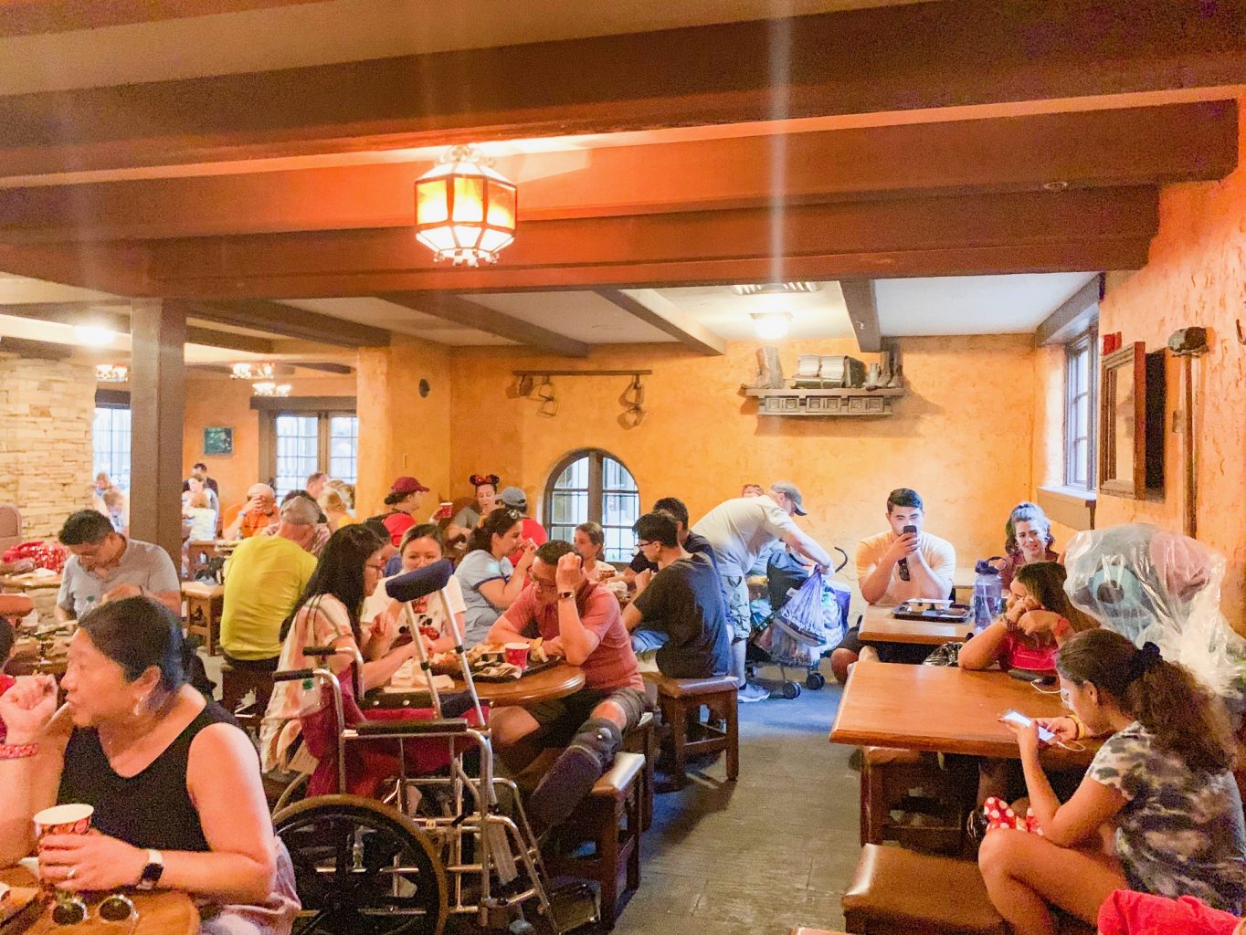 people sitting and eating at tables in Pecos Bill best disney restaurant