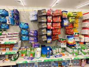 shelf stocked with various first aid supplies