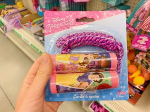 hand holding princess themed jump rope Dollar Tree Disney