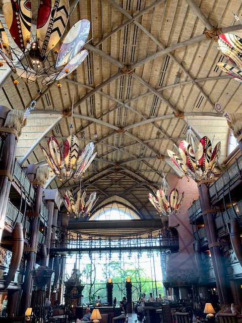 wooden thatched ceiling and decorative lights in african inspired hotel lobby