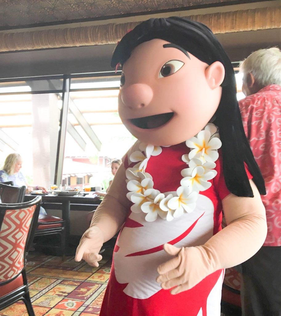 lilo character wearing lei greetings guests