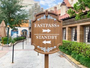wooden disney sign fastpass and standby