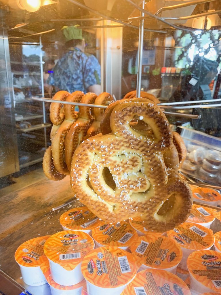 mickey shaped pretzels hanging on rack hollywood studios quick service