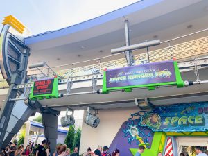 entrance and sign to Buzz Lightyear ride Disney Secrets