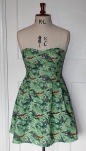 green strapless dress with Jungle Book characters