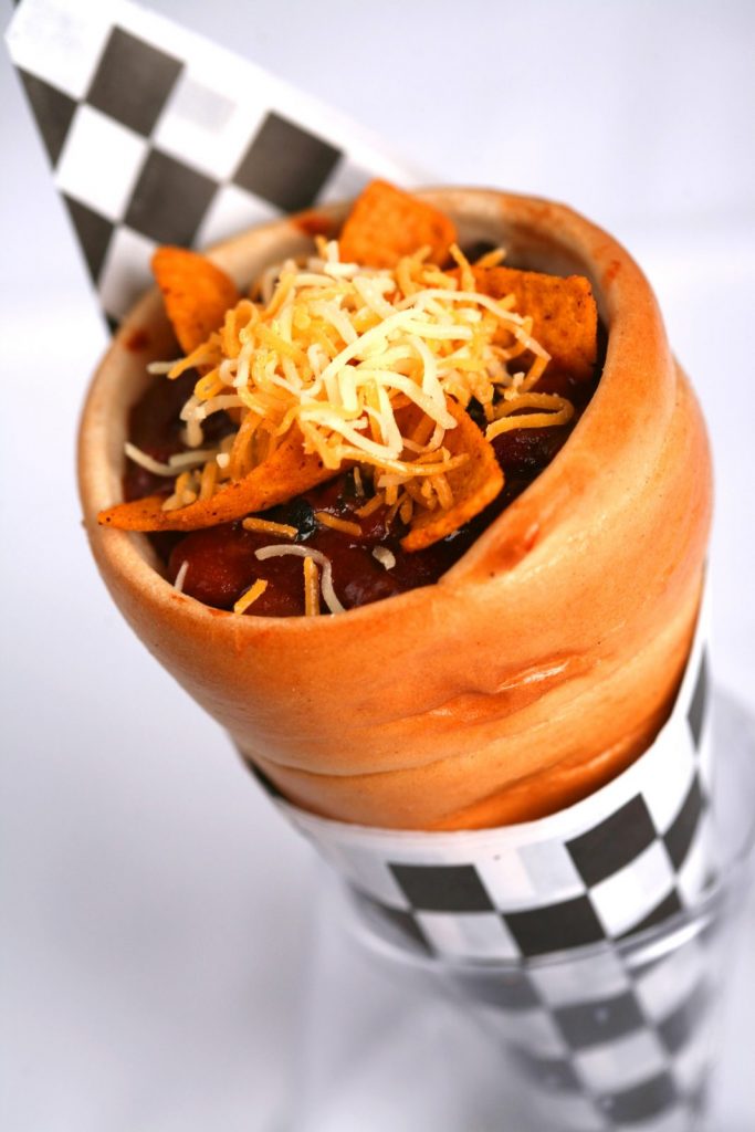 A Chili Cone Queso, available at Cozy Cone Motel, one of the best Disneyland restaurants