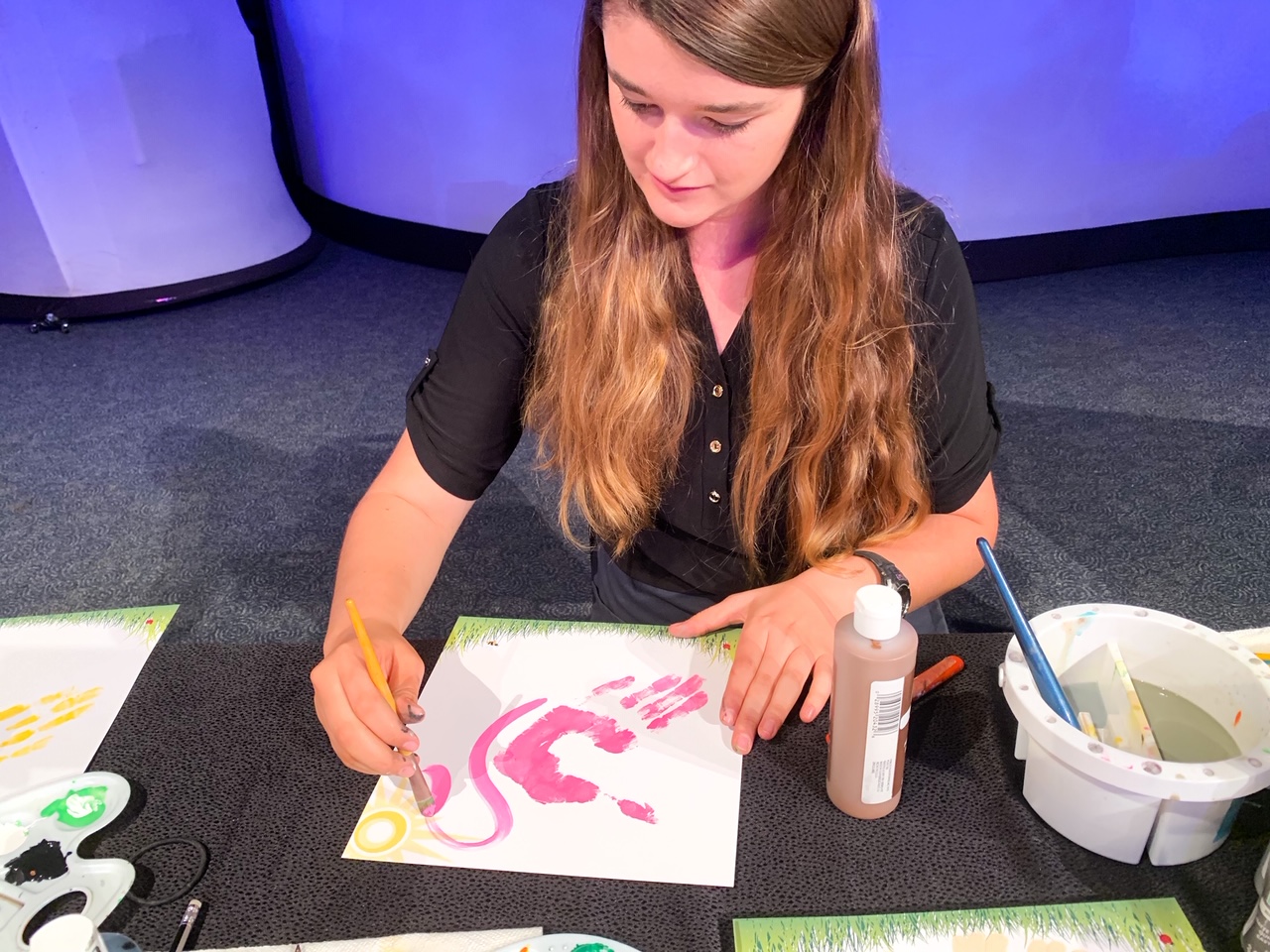 Disney artist creating art from a handprint