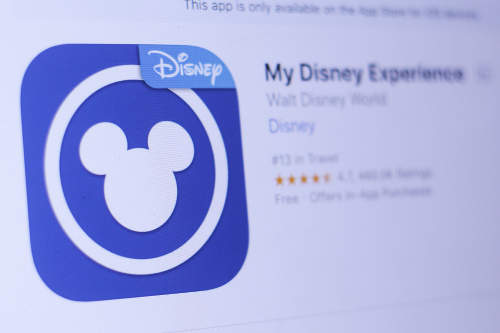 blue app icon with white mickey head for my disney experience disney on a budget 