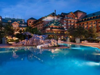 large cabin-inspired buildings with pool in front Disney World Resorts