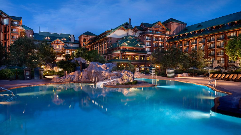 large cabin-inspired buildings with pool in front Disney World Resorts