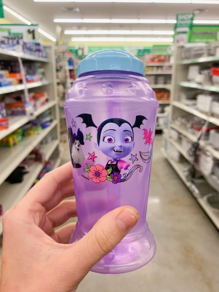 purple water bottle with child vampire on it 