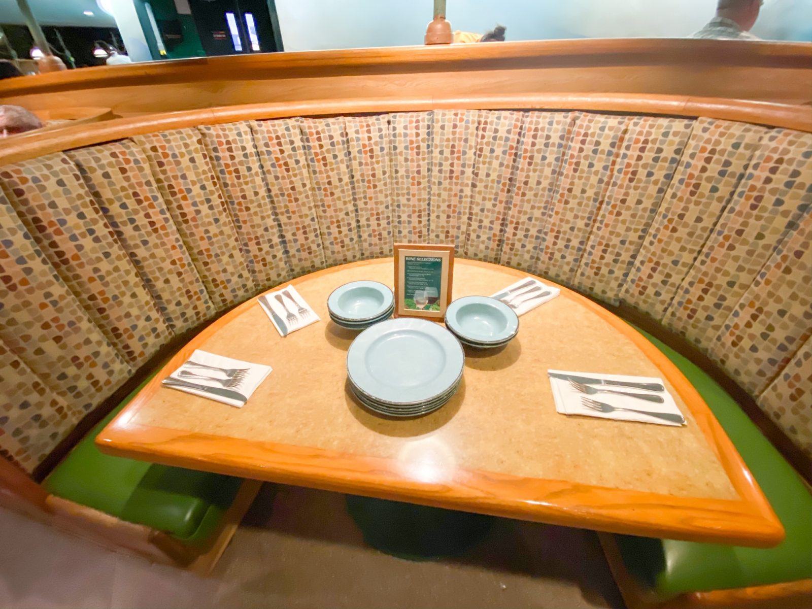 table with Mickey Shaped plates at Epcot's Garden Grill Restaurant 