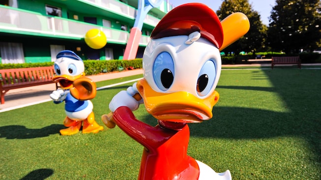 At one of the Disney Value Resorts, specifically at the All Star Sports resort, you can find statues of Huey playing baseball outside to help create theming!