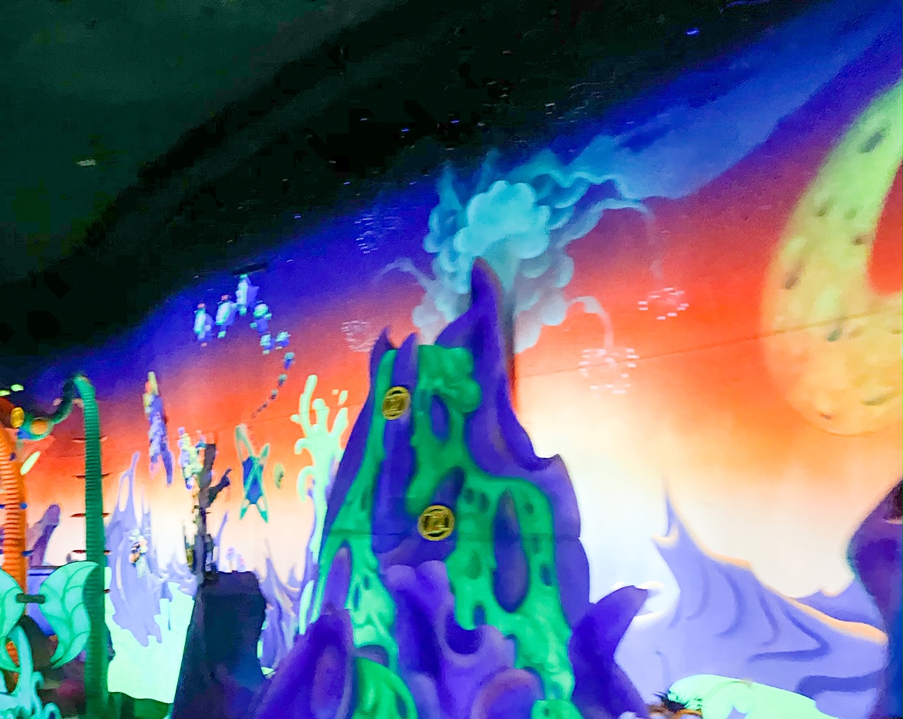 close up view of volcano and scoring on Buzz lightyear ride