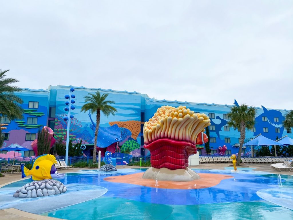 A photo of Art of Animation Resort, which features a finding nemo splash pad-- it is perfect for Disney with toddlers! They love these familiar characters.
