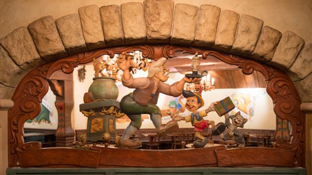 A wood carving inside Chalet de la Marrionnette in Disneyland Paris