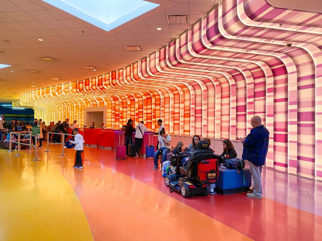 photo of the bright and colourful lobby of Art of Animation; best Disney resort for kids