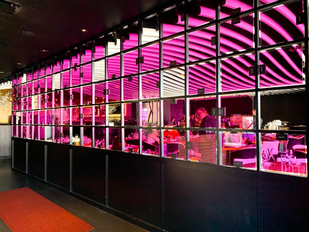 purple wall inside Disney Springs bar stk Orlando