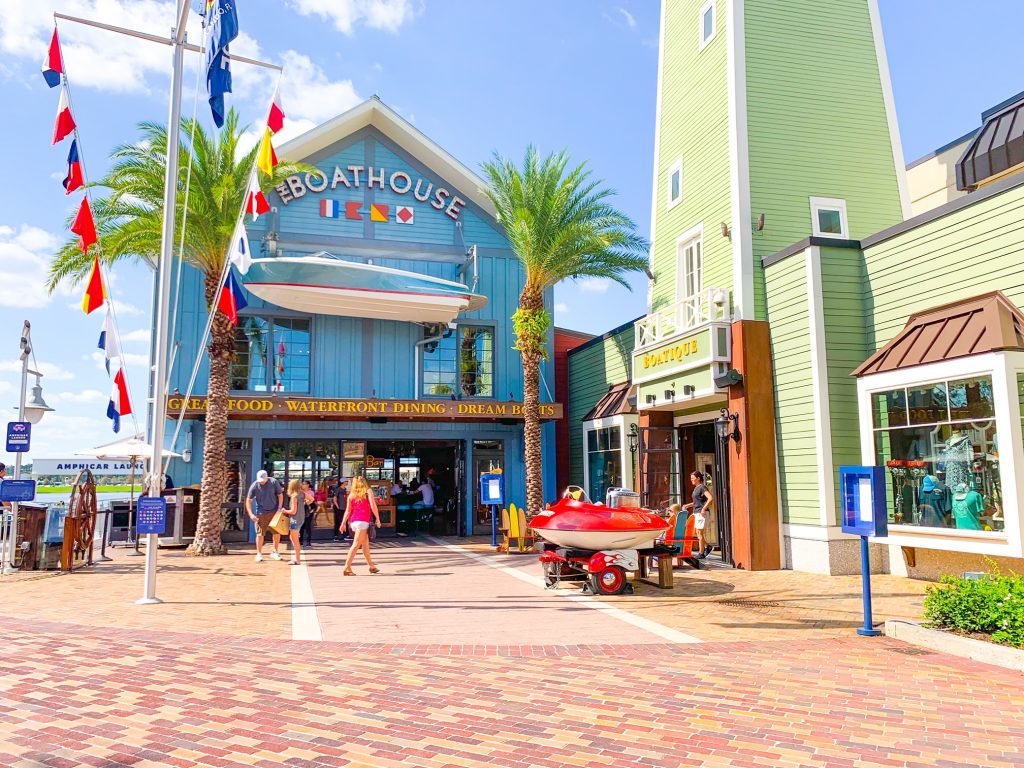 people in front of disney springs bar the boathouse