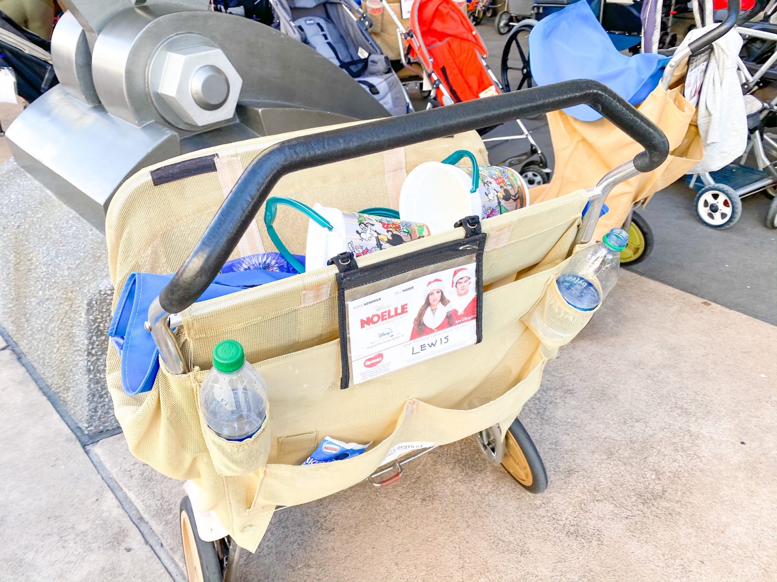 When trying to find your strollers at Disney, look for ways to ID them: this stroller has a laminated card on the back with a name! 