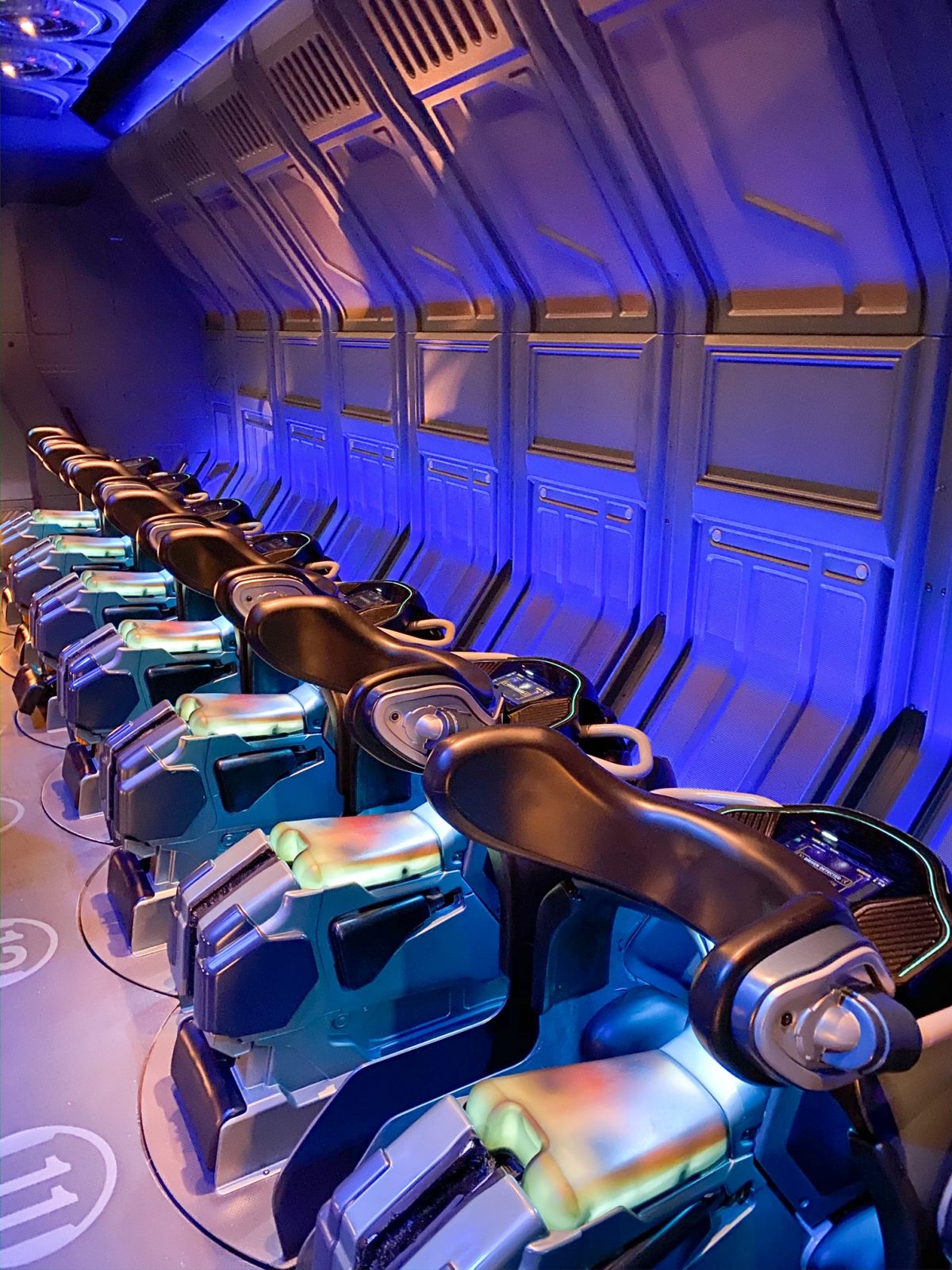 The seats of flight of passage; this is a ride at Disney World that you can bring bags on