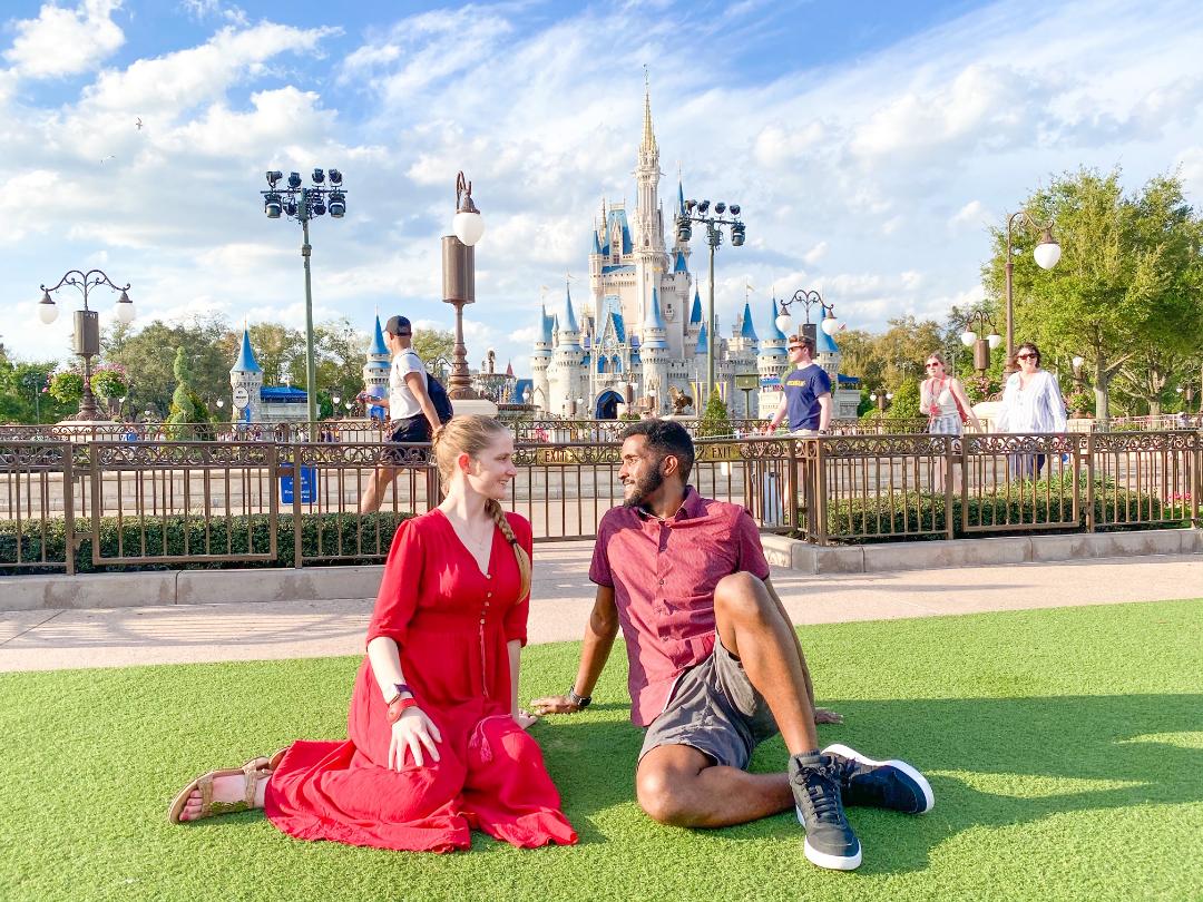 couple sitting at Magic Kingdom