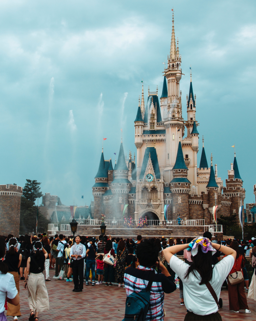 guests in front of the Tokyo Disneyland castle