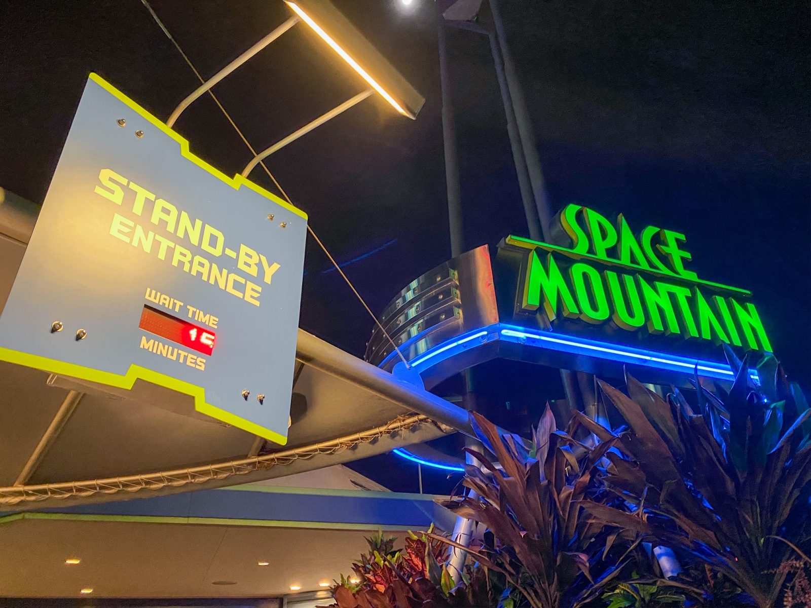 view of stands-by entrance sign for space mountain