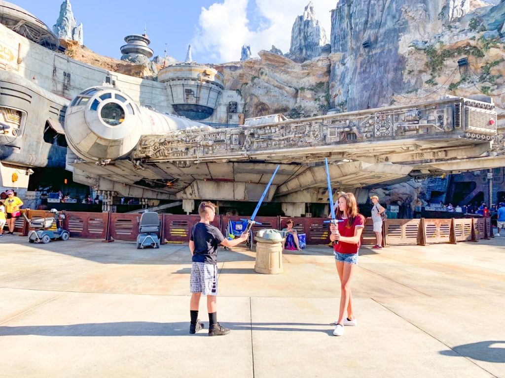 photo of kids playing with lightsabers, you may end up bringing these home from Disney!