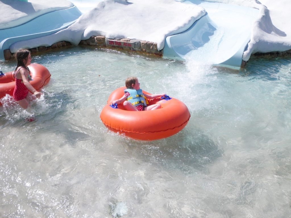 photo of small children playing on the slides at the Ski Patrol training camp - great fun at Disney water parks