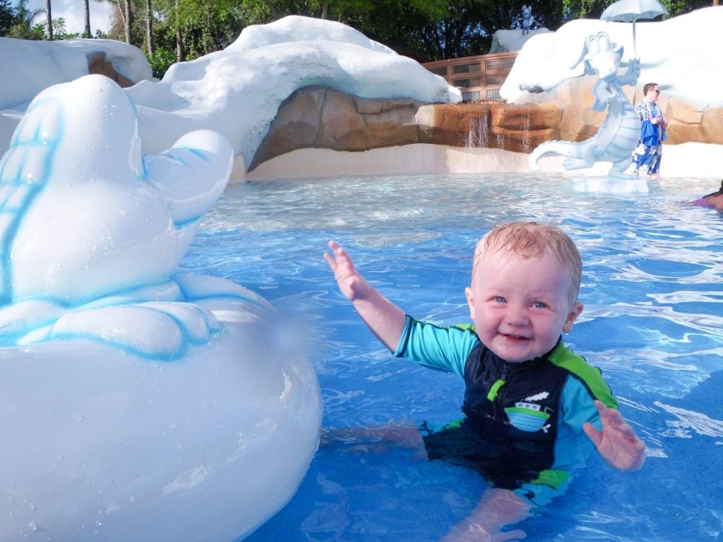 photo of smiling baby playing in Tike's Peak, the dedicated area for smaller kids at Blizzard Beach - will this make it your favourite Disney water park?