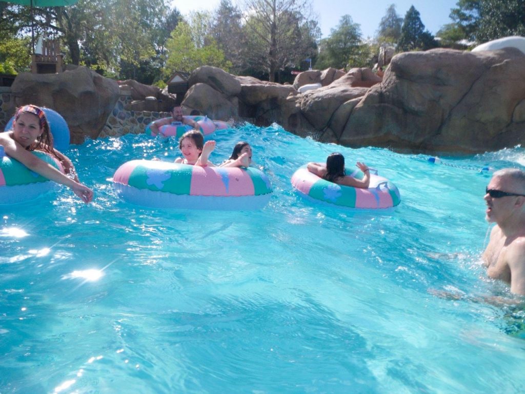 people in tube rings in the wave pool at Blizzard Beach - will this be your winner in the Blizzard Beach vs Typhoon Lagoon debate?