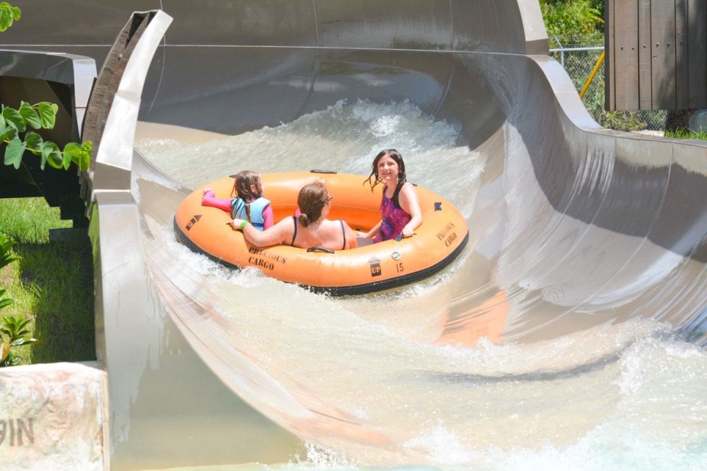 photo of family ride at Typhoon lagoon - will Miss Adventure falls swing your Typhoon Lagoon vs Blizzard Beach debate?