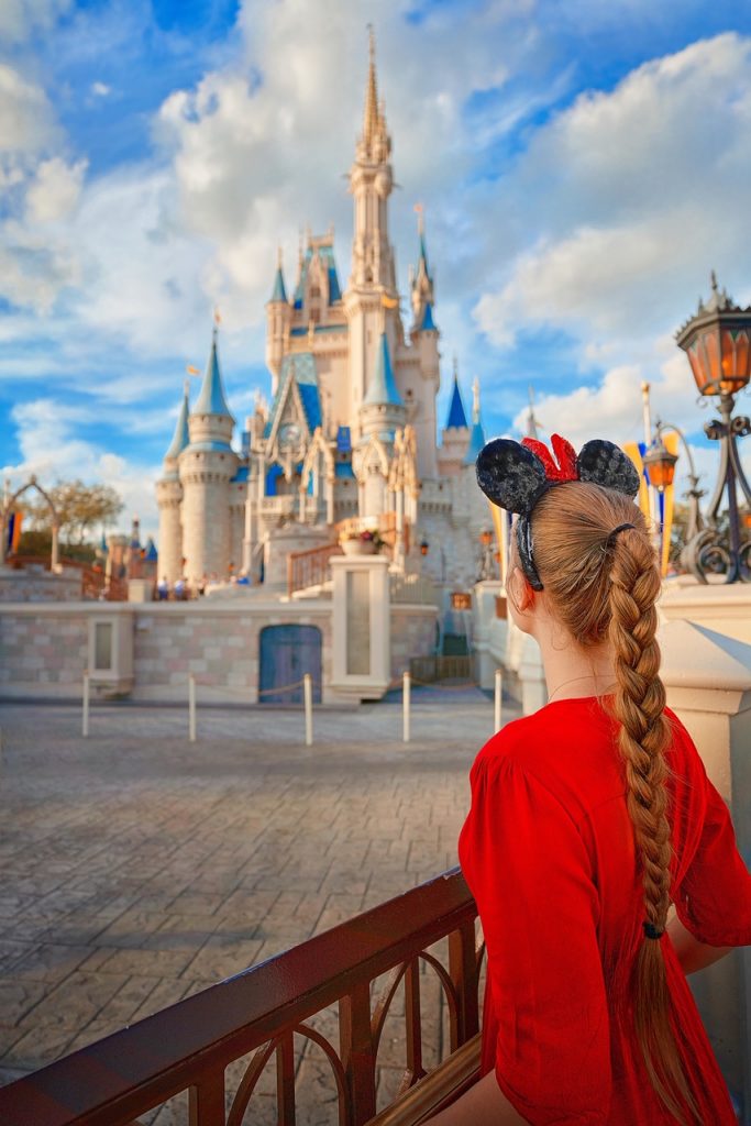 Picture of Victoria at Disney Castle.