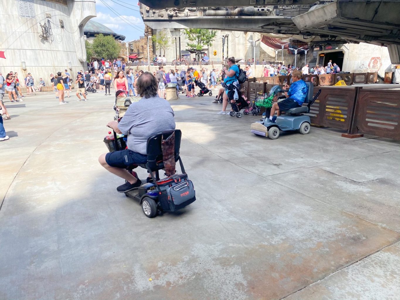 Person riding ECV at Disney World