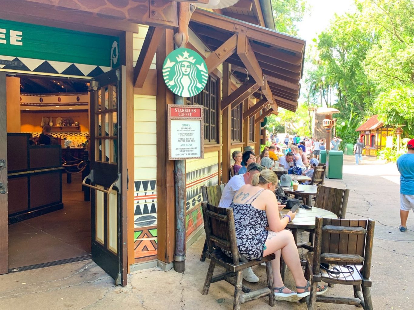 Patrons sit outside of creature Comforts in Animal Kingdom.