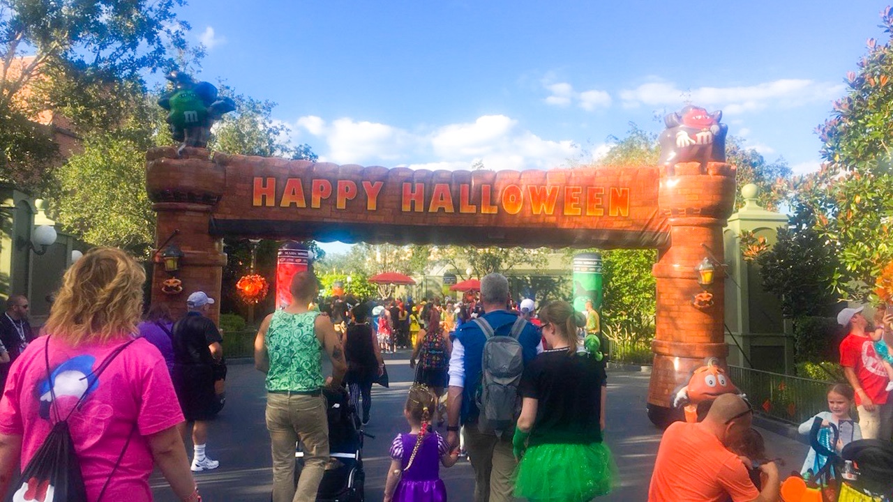 happy halloween sign at the entrance to Mickey's not so scary halloween party 