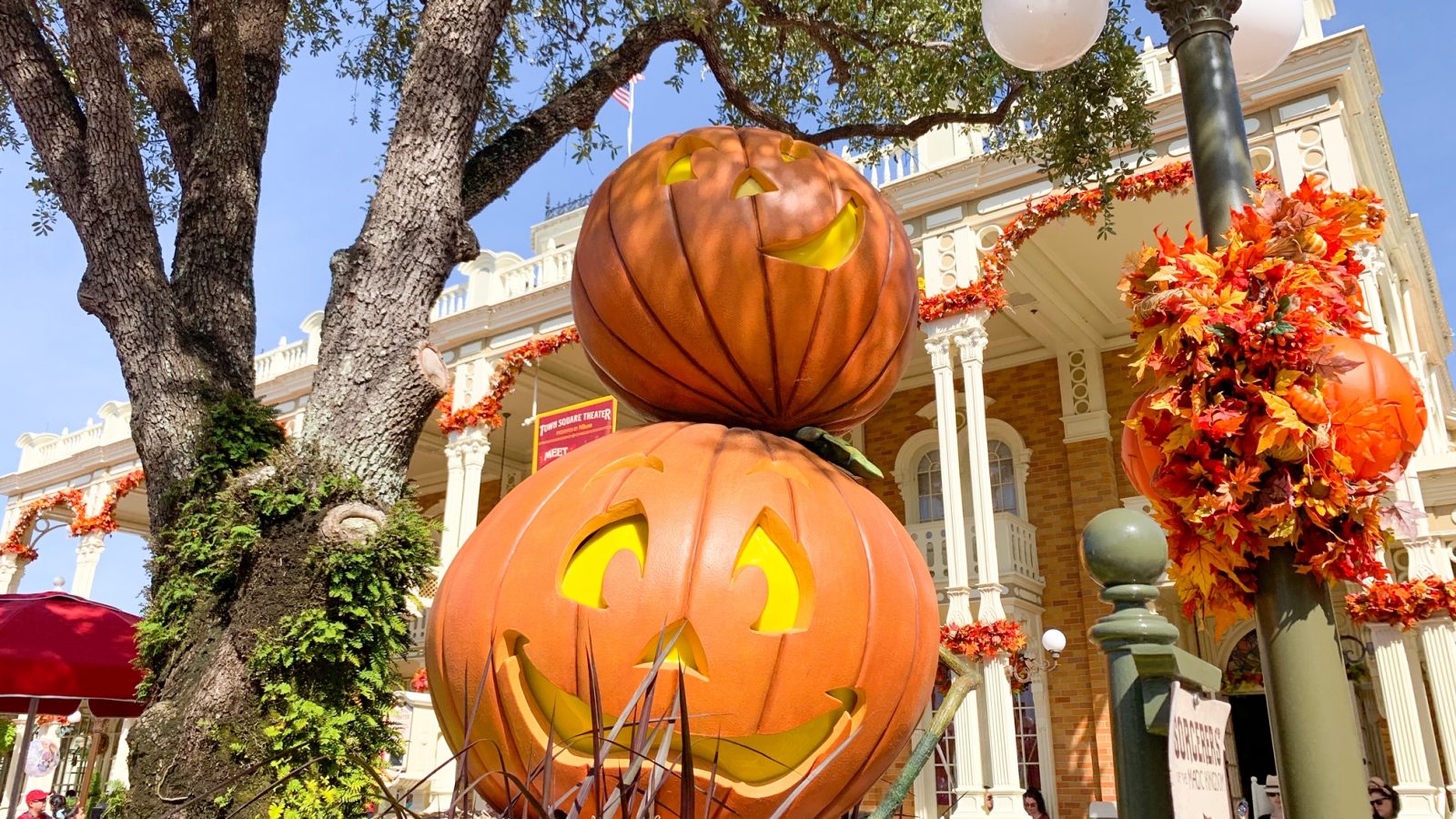 pumpkin decorations outside town square theater in magic kingdom