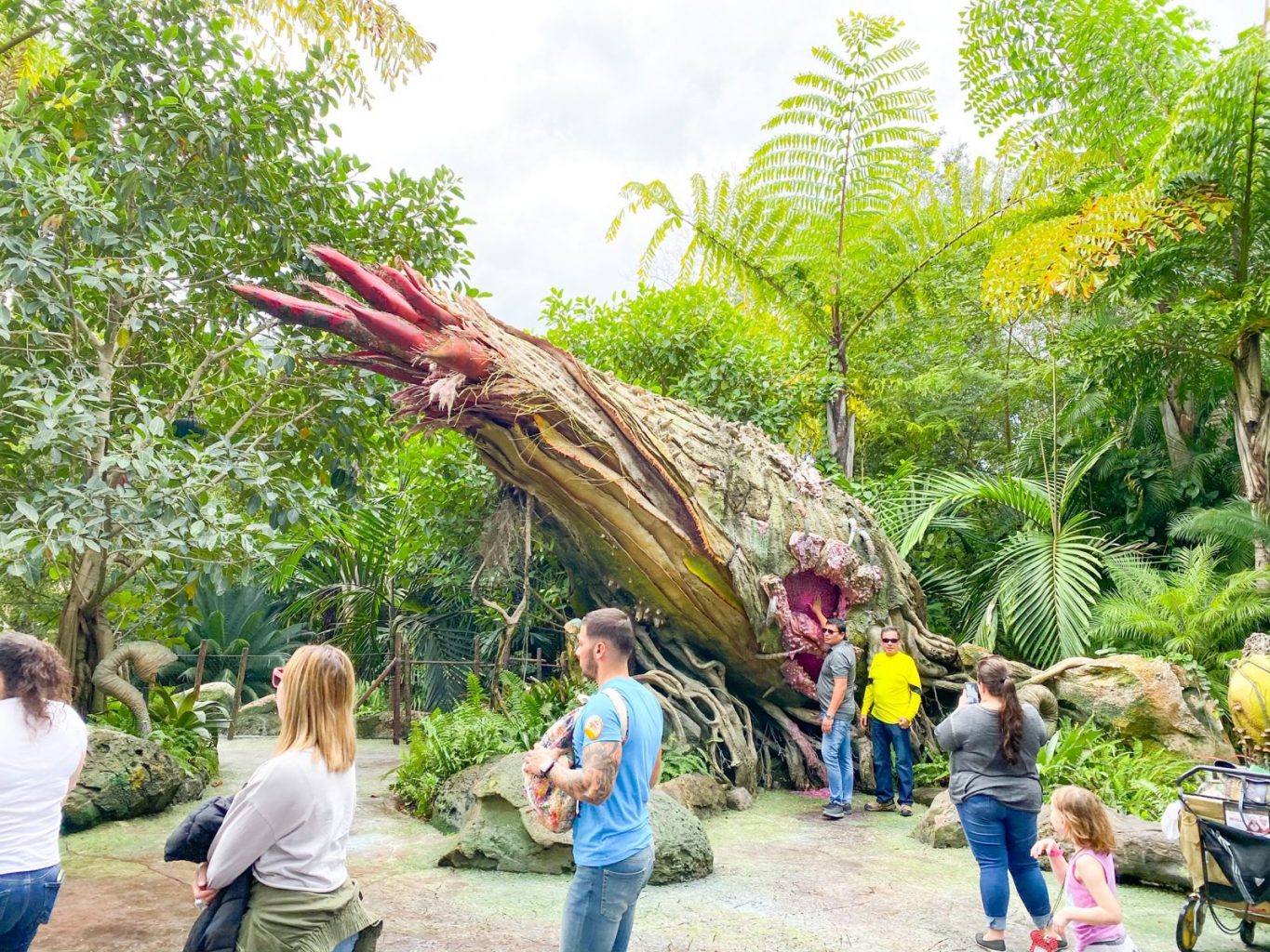 people walking near giant pod in Animal Kingdom