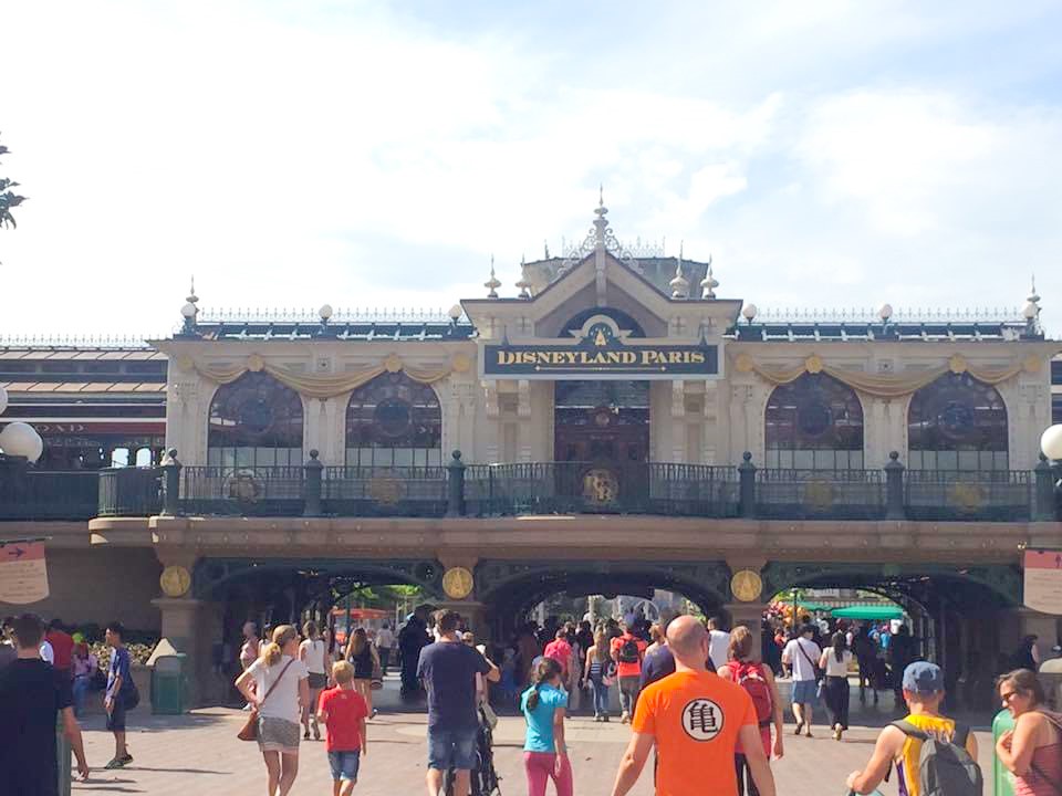 image of the train station within Disneyland Paris park; take a trip around the park on the train when spending one day in Disneyland Paris