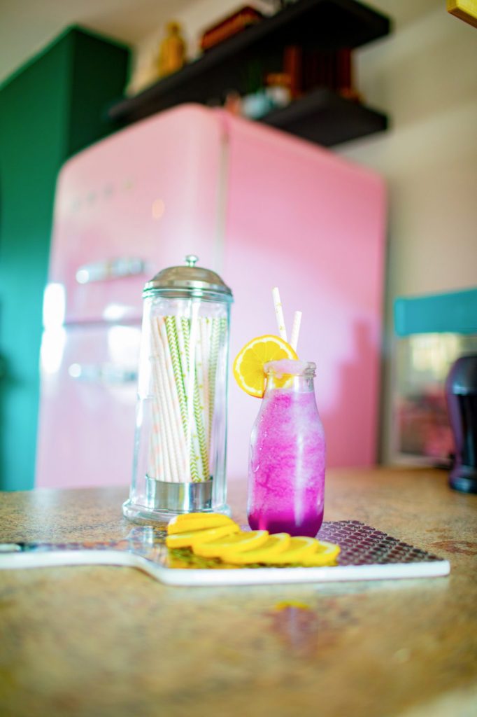 further away photo of Epcot Violet Lemonade on counter