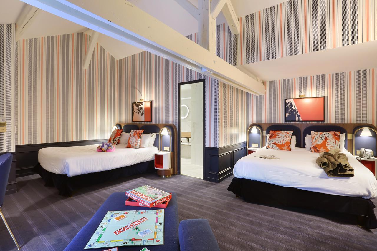 A family room with games at the Cheval Blanc Hotel near Disneyland Paris