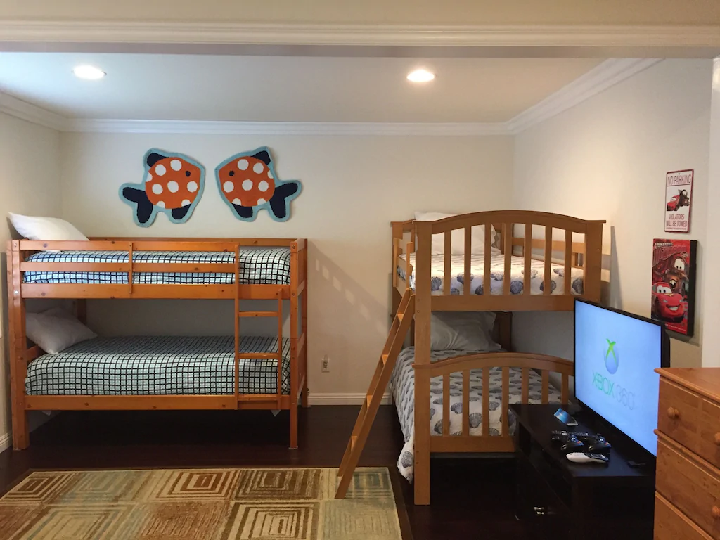 room with 2 bunk beds in the Flexcation house vacation rental near Disneyland